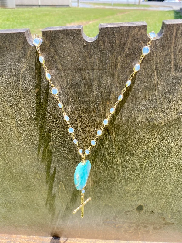 aquamarine cross